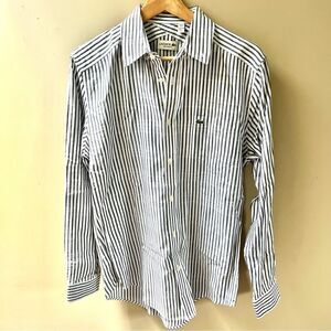 Lacoste grey striped button down reg fit.   Size M